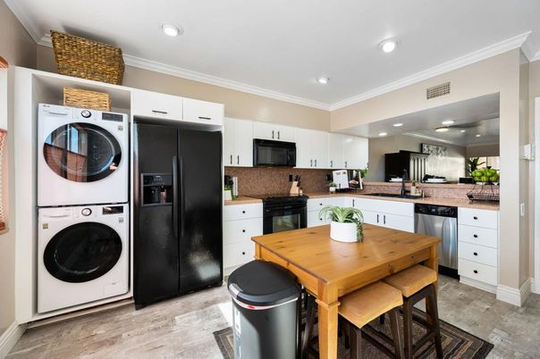 Dining room, Interior, Kitchen, Recessed Lighting, Stainless Steel Appliances, Washer, Wood Texture Flooring
