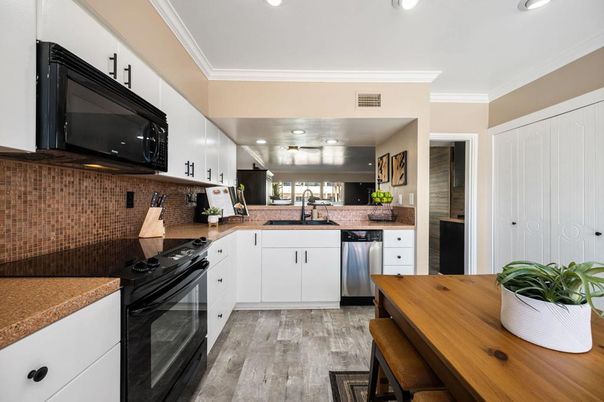 Interior, Kitchen, Recessed Lighting, Stainless Steel Appliances, Wood Texture Flooring