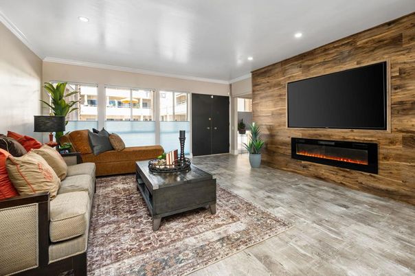 Fireplace, Interior, Living room, Recessed Lighting, Water, Wood Texture Flooring, Wooden Walls