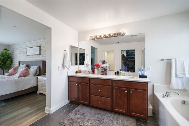 Bathroom, Bedroom, Dual Sink Vanities, Interior, Stone Walls, Wood Texture Flooring