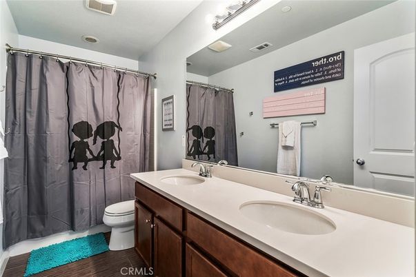Bathroom, Dual Sink Vanities, Interior, Recessed Lighting, Wood Texture Flooring
