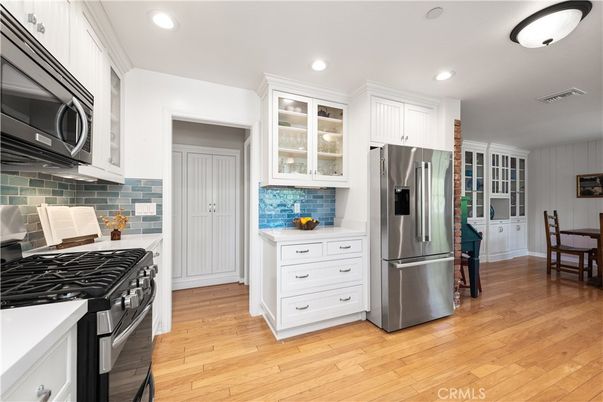 Dining room, Interior, Kitchen, Recessed Lighting, Stainless Steel Appliances, Wood Texture Flooring