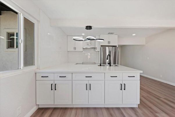 Interior, Kitchen, Marble Walls, Pendant Lights, Recessed Lighting, Wood Texture Flooring