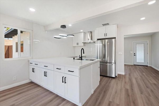 Interior, Kitchen, Pendant Lights, Recessed Lighting, Stainless Steel Appliances, Wood Texture Flooring
