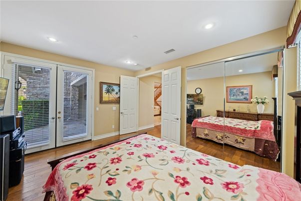 Bedroom, Fireplace, Interior, Recessed Lighting, Wood Texture Flooring