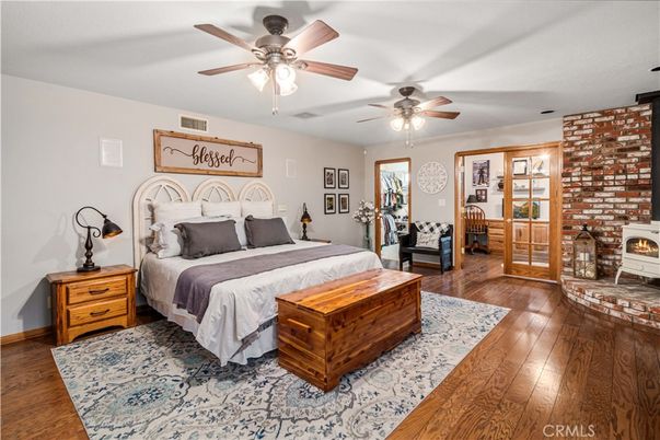 Bedroom, Fireplace, Interior, Stone Walls, Wood Texture Flooring
