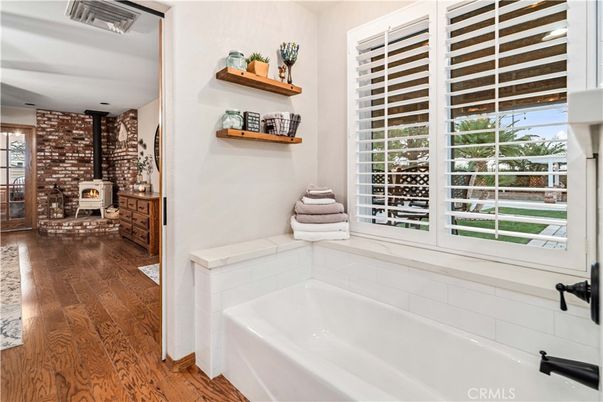 Bathroom, Fireplace, Interior, Stone Walls, Wood Texture Flooring