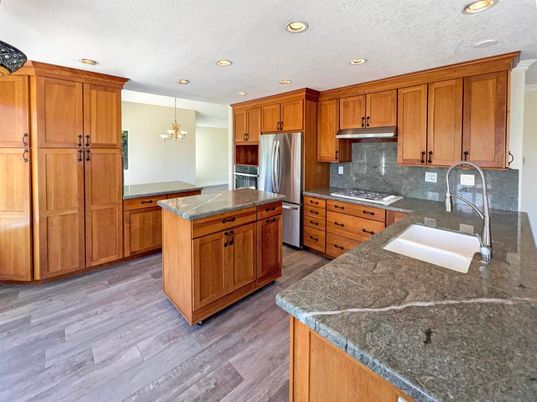Chandelier, Interior, Kitchen, Recessed Lighting, Stainless Steel Appliances, Wood Texture Flooring