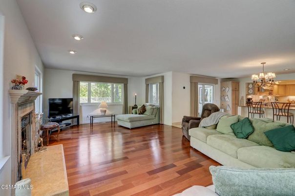 Chandelier, Fireplace, Interior, Living room, Recessed Lighting, Wood Texture Flooring