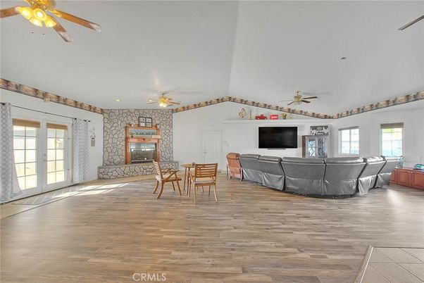 Dining room, Fireplace, Interior, Living room, Stone Walls, Wood Texture Flooring