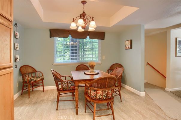 Chandelier, Dining room, Interior, Kitchen, Tile Countertops, Wood Texture Flooring