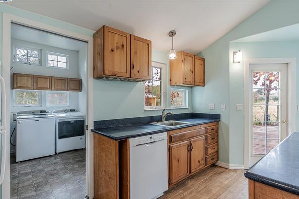 Interior, Kitchen, Pendant Lights, Washer, Wood Texture Flooring