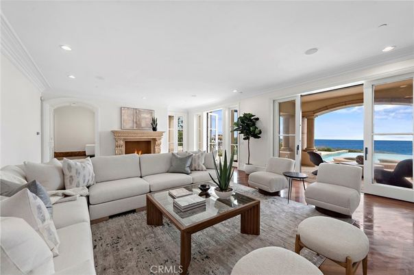 Fireplace, Interior, Living room, Recessed Lighting, Water, Wood Texture Flooring