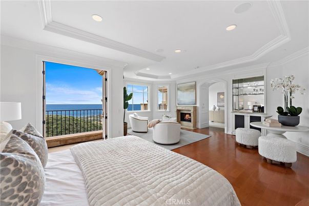Bedroom, Fireplace, Interior, Recessed Lighting, Water, Wood Texture Flooring