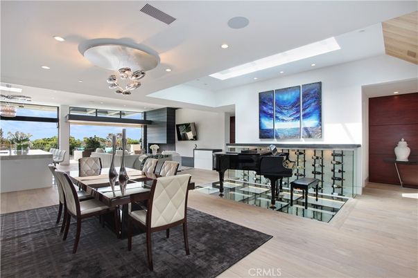 Dining room, Interior, Living room, Piano, Recessed Lighting, Water, Wood Texture Flooring