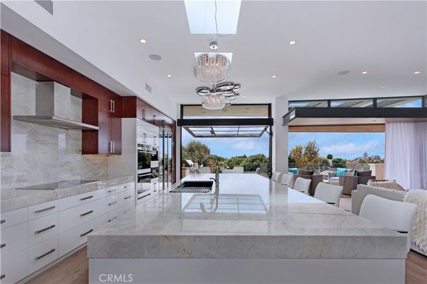 Chandelier, Interior, Kitchen, Pendant Lights, Recessed Lighting, Stainless Steel Appliances, Wood Texture Flooring