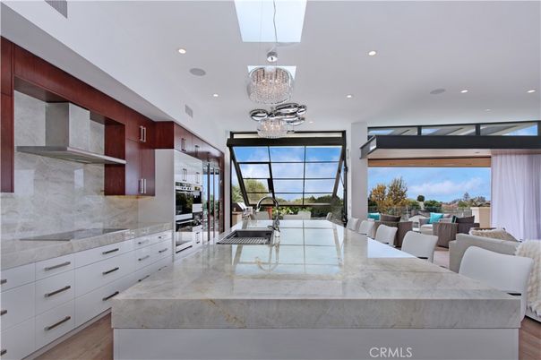 Chandelier, Interior, Kitchen, Pendant Lights, Recessed Lighting, Stainless Steel Appliances, Wood Texture Flooring