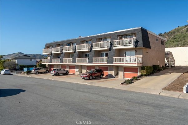 Attached, Exterior, Facade, Condo Building
