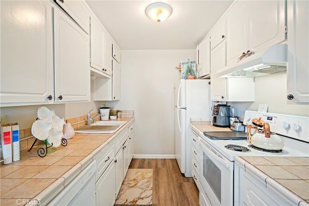 Interior, Kitchen, Tile Countertops, Wood Texture Flooring