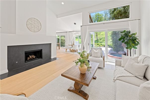 Dining room, Fireplace, Interior, Living room, Pendant Lights, Recessed Lighting, Wood Texture Flooring