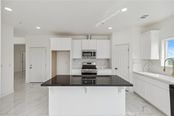 Interior, Kitchen, Marble, Marble Walls, Recessed Lighting, Stainless Steel Appliances