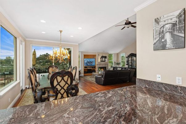 Chandelier, Dining room, Fireplace, Interior, Living room, Recessed Lighting, Wood Texture Flooring