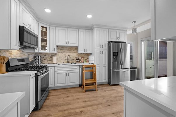 Interior, Kitchen, Pendant Lights, Recessed Lighting, Stainless Steel Appliances, Wood Texture Flooring