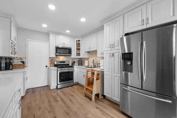 Interior, Kitchen, Recessed Lighting, Stainless Steel Appliances, Wood Texture Flooring