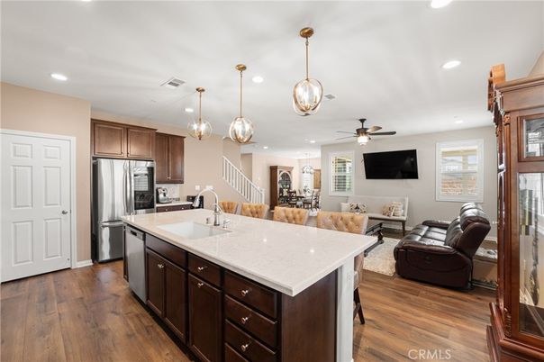 Dining room, Interior, Kitchen, Living room, Pendant Lights, Recessed Lighting, Stainless Steel Appliances, Wood Texture Flooring
