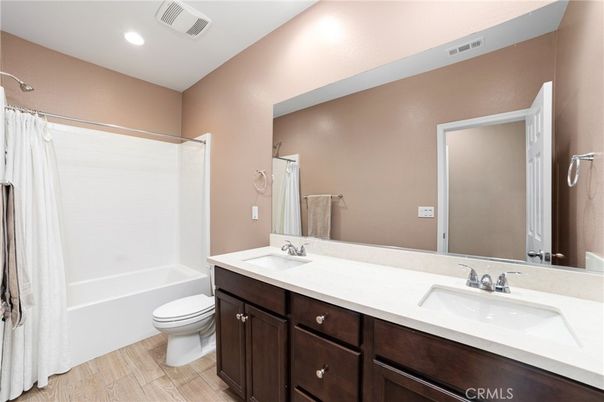 Bathroom, Dual Sink Vanities, Interior, Recessed Lighting, Wood Texture Flooring