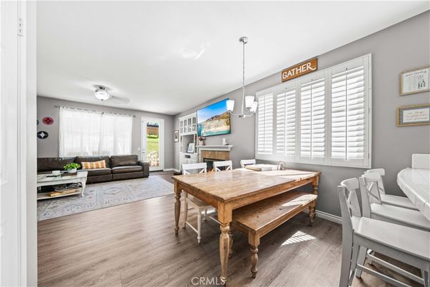 Dining room, Fireplace, Interior, Living room, Pendant Lights, Wood Texture Flooring