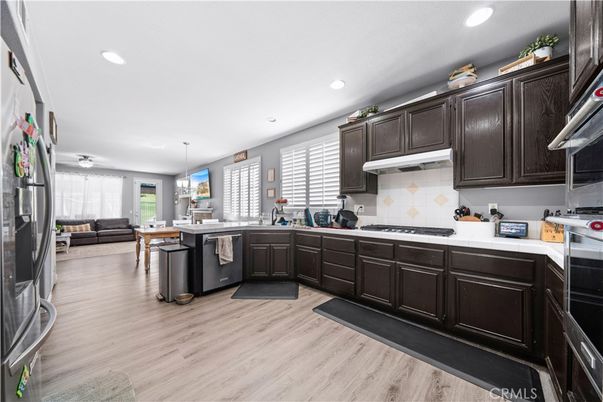 Dining room, Interior, Kitchen, Pendant Lights, Recessed Lighting, Stainless Steel Appliances, Wood Texture Flooring