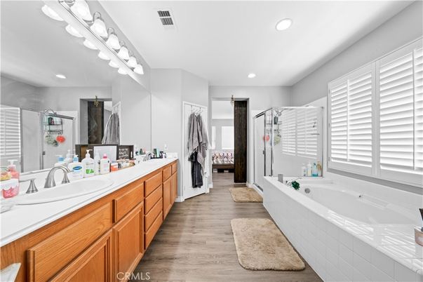 Bathroom, Dual Sink Vanities, Interior, Recessed Lighting, Wood Texture Flooring