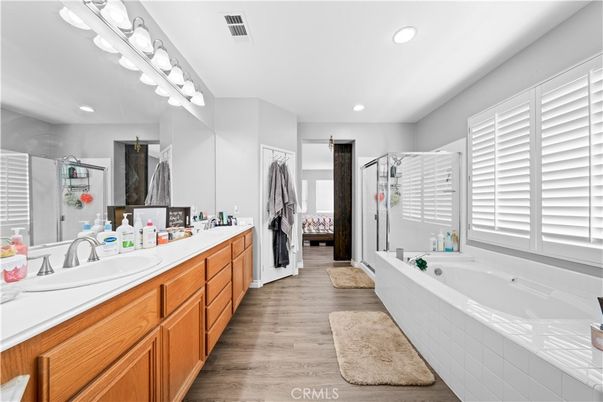 Bathroom, Dual Sink Vanities, Interior, Recessed Lighting, Wood Texture Flooring