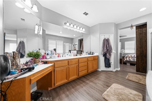 Bathroom, Dual Sink Vanities, Interior, Recessed Lighting, Wood Texture Flooring