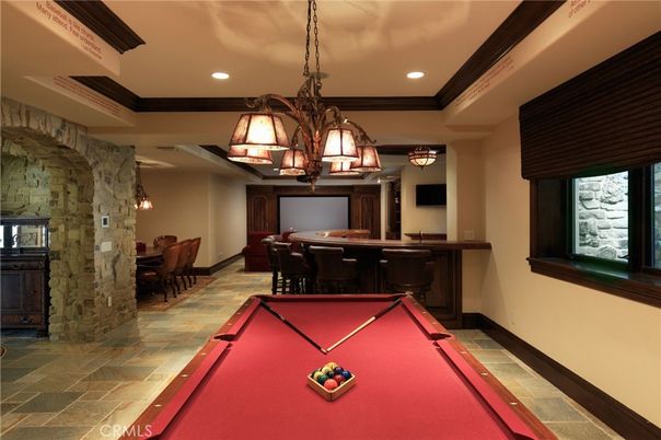 Billiard Table, Chandelier, Game Room, Interior, Pendant Lights, Projection Screen, Recessed Lighting, Stone Walls