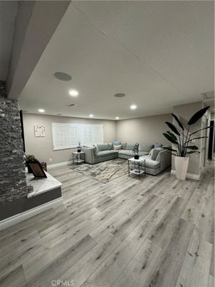 Interior, Living room, Recessed Lighting, Stone Walls, Wood Texture Flooring