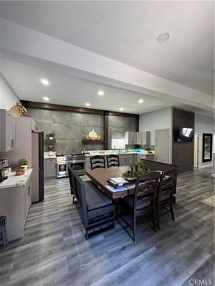 Dining room, Interior, Kitchen, Recessed Lighting, Stainless Steel Appliances, Wood Texture Flooring