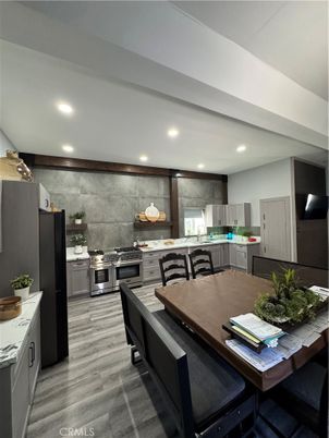 Dining room, Interior, Kitchen, Recessed Lighting, Stainless Steel Appliances, Wood Texture Flooring