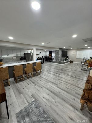 Dining room, Interior, Kitchen, Recessed Lighting, Stainless Steel Appliances, Wood Texture Flooring