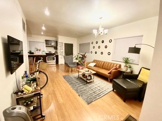 Chandelier, Interior, Living room, Recessed Lighting, Wood Texture Flooring