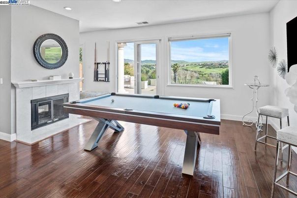 Billiard Table, Fireplace, Game Room, Interior, Recessed Lighting, Wood Texture Flooring