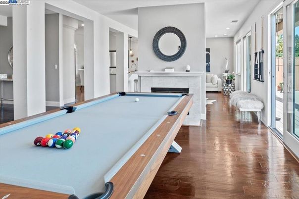 Billiard Table, Fireplace, Game Room, Interior, Recessed Lighting, Wood Texture Flooring