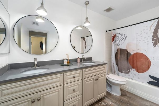 Bathroom, Dual Sink Vanities, Interior, Pendant Lights, Wood Texture Flooring