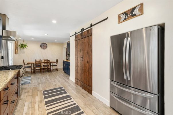 Dining room, Interior, Kitchen, Recessed Lighting, Stainless Steel Appliances, Wood Texture Flooring