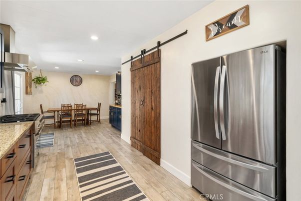 Dining room, Interior, Kitchen, Recessed Lighting, Stainless Steel Appliances, Wood Texture Flooring