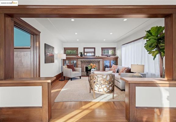 Fireplace, Interior, Living room, Recessed Lighting, Stone Walls, Wood Texture Flooring