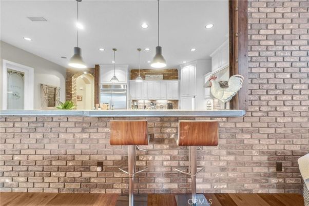 Interior, Kitchen, Pendant Lights, Recessed Lighting, Stainless Steel Appliances, Stone Walls, Wood Texture Flooring