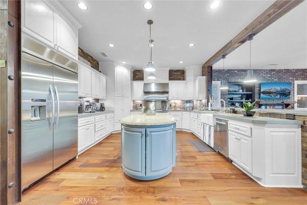 Interior, Kitchen, Pendant Lights, Recessed Lighting, Stainless Steel Appliances, Stone Walls, Wood Texture Flooring