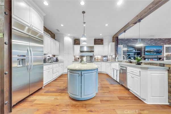 Interior, Kitchen, Pendant Lights, Recessed Lighting, Stainless Steel Appliances, Stone Walls, Wood Texture Flooring